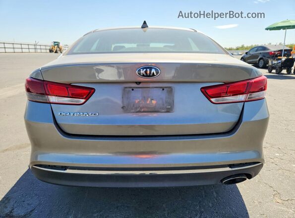 5XXGT4L34JG198455 2018 KIA OPTIMA Золотой Вид салона спереди