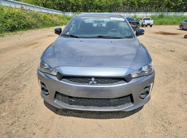 JA32U2FU0HU014261 2017 MITSUBISHI LANCER Gray Widok z tyłu
