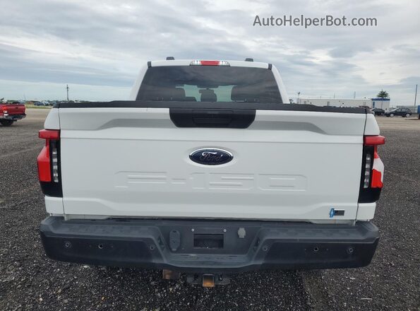 1FT6W1EV0PWG32426 2023 FORD F-150 LIGHTNING Белый Вид салона спереди