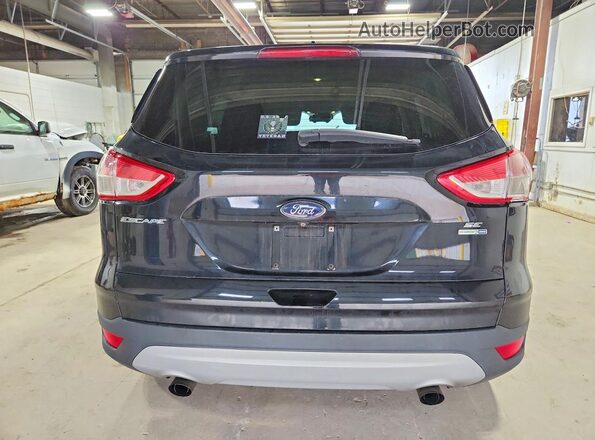 1FMCU9G99GUA77457 2016 FORD ESCAPE Black Widok wnętrza z przodu