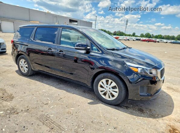 KNDMB5C19H6306877 2017 KIA SEDONA Черный Вид спереди