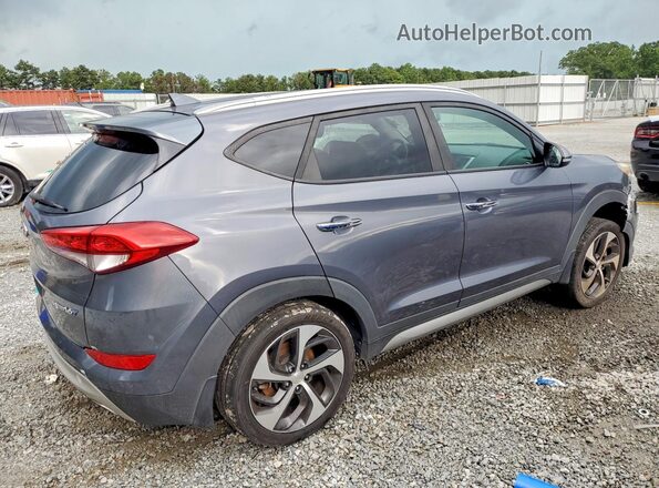 KM8J33A23HU352289 2017 HYUNDAI TUCSON Gray Front right