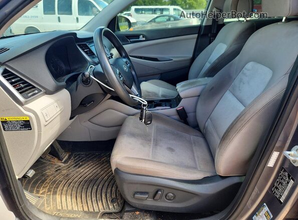 KM8J33A47GU228770 2016 HYUNDAI TUCSON Charcoal Vista del salpicadero