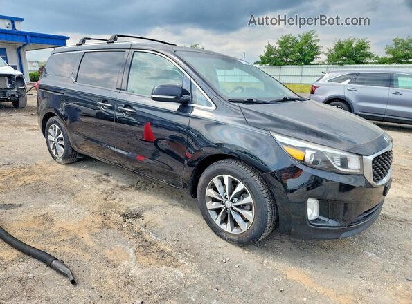 KNDMC5C12G6159054 2016 KIA SEDONA Black Widok z przodu