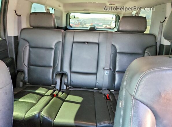 1GNSKHKCXKR119981 2019 CHEVROLET SUBURBAN Черный Вид задней части салона