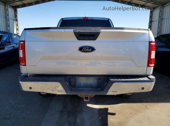 1FTFX1E58JKC65688 2018 FORD F150 Silver Vista interior delantera
