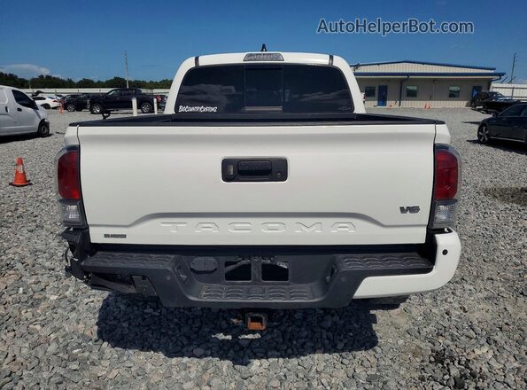 3TMAZ5CN5MM159209 2021 TOYOTA TACOMA Белый Вид салона спереди