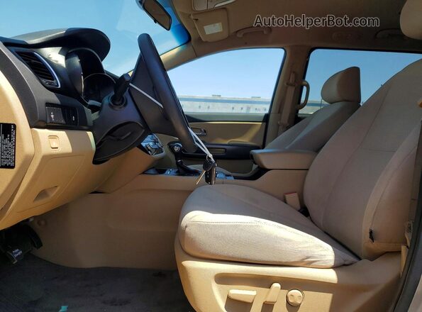 KNDMB5C18G6140138 2016 KIA SEDONA Tan Вид панелі приладів