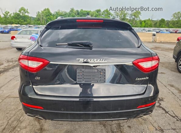 ZN661XUA8JX299215 2018 MASERATI LEVANTE Black Front interior view