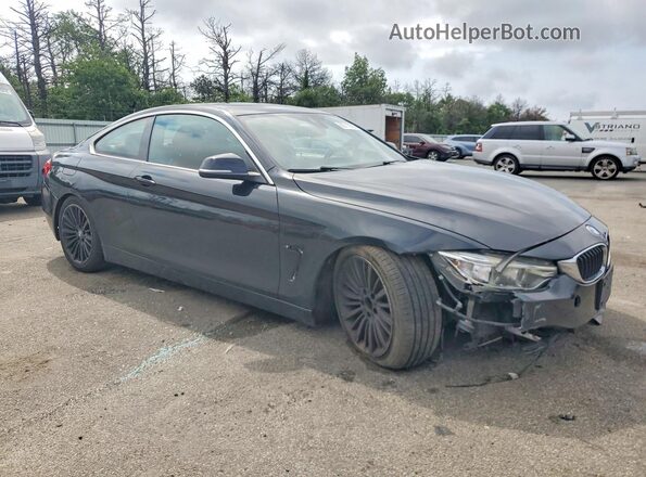 WBA3N9C52GK249650 2016 BMW 4 SERIES Black Front view