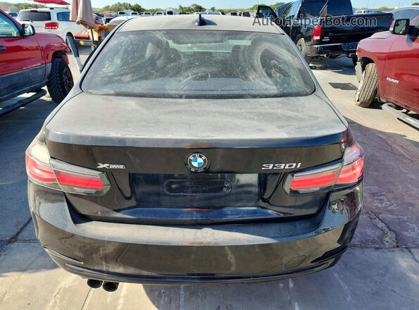 WBA8D9G52JNU70111 2018 BMW 3 SERIES Черный Вид салона спереди