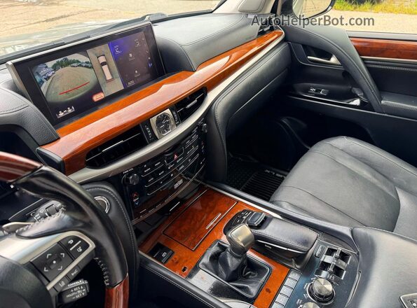 JTJHY7AX4J4261428 2018 LEXUS LX Gray Vista de los asientos traseros