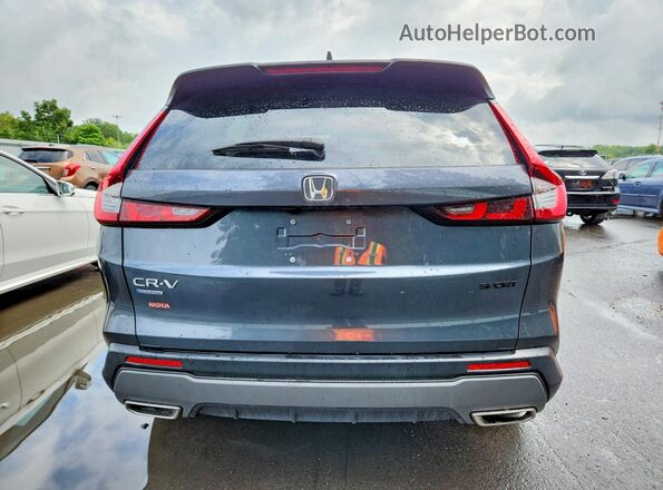 2HKRS6H5XRH813107 2024 HONDA CR-V Синий Вид салона спереди