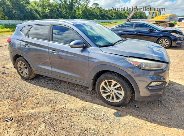 KM8J33A47GU228770 2016 HYUNDAI TUCSON Charcoal Vista frontal