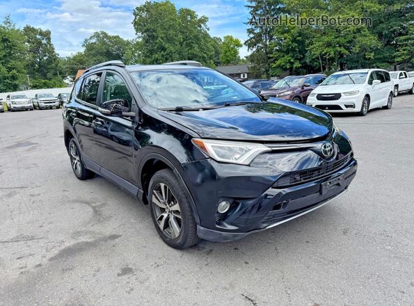2T3RFREV4JW857885 2018 TOYOTA RAV4 Black Widok z przodu
