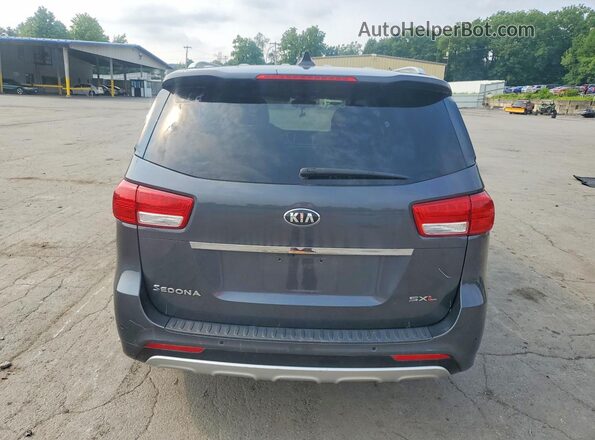 KNDME5C19G6171308 2016 KIA SEDONA Gray Вид салону спереду