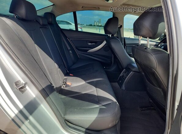 WBA8A9C5XJAH14547 2018 BMW 3 SERIES Silver Rear interior view