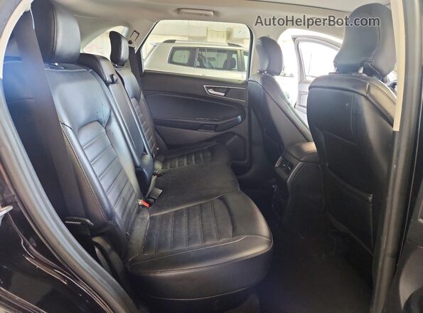 2FMPK4J95KBC26190 2019 FORD EDGE Black Вид задньої частини салону