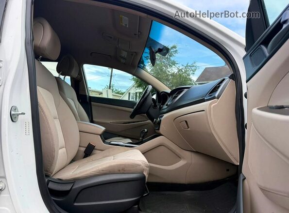 KM8J3CA28HU295247 2017 HYUNDAI TUCSON White Vista de los asientos traseros