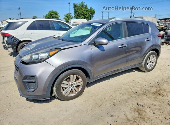 KNDPM3AC8K7559075 2019 KIA SPORTAGE Silver Trasero izquierdo