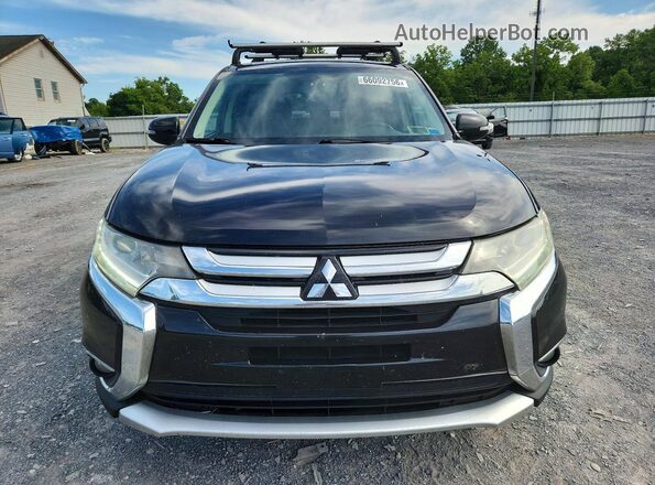JA4AZ3A3XJJ002722 2018 MITSUBISHI OUTLANDER Black Հետևի տեսք