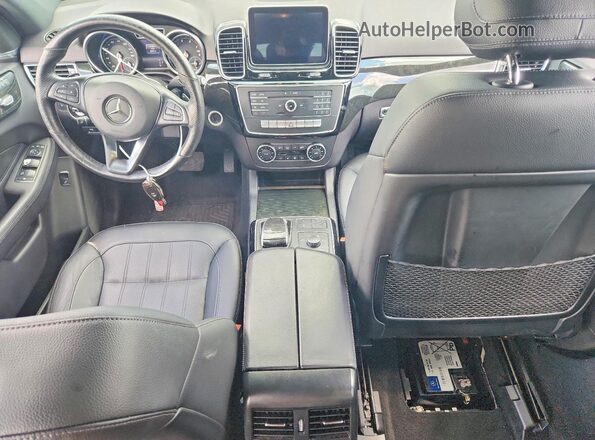 4JGDA5HB2GA693851 2016 MERCEDES-BENZ GLE Black Առջևի վահանակի տեսք
