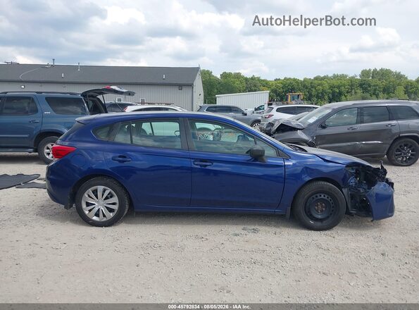 4S3GTAA60H3754072 2017 SUBARU IMPREZA Blue Widok wnętrza z tyłu