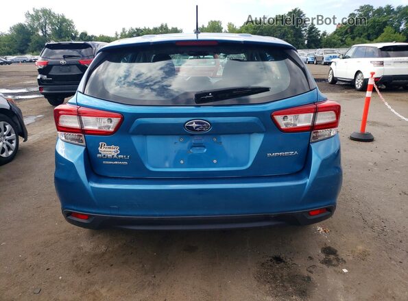 4S3GTAA65J3727181 2018 SUBARU IMPREZA Синий Вид сзади
