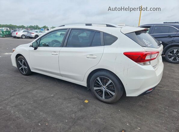 4S3GTAC67K3732509 2019 SUBARU IMPREZA White Trasero izquierdo