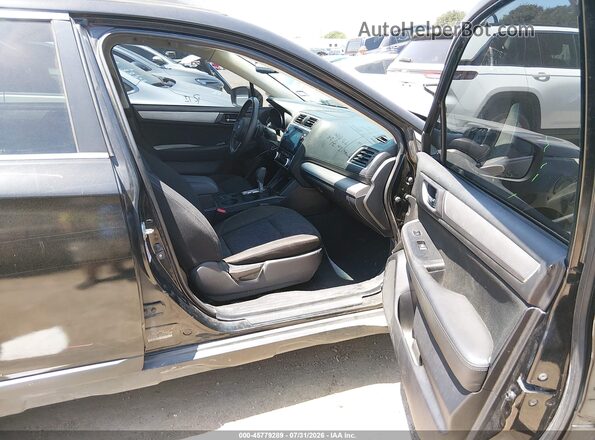 4S4BSAFC9K3282534 2019 SUBARU OUTBACK Black Front interior view