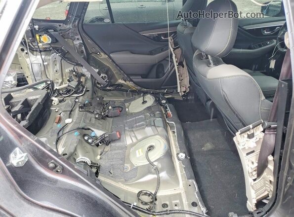 4S4BTAJC8P3124052 2023 SUBARU OUTBACK Серый Вид задней части салона