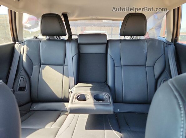 4S4BTGPD7S3304652 2025 SUBARU OUTBACK Burgundy Vista de los asientos traseros