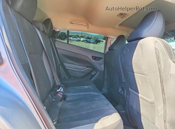4S4GUHD68T3713338 2026 SUBARU CROSSTREK Silver Vista interior trasera