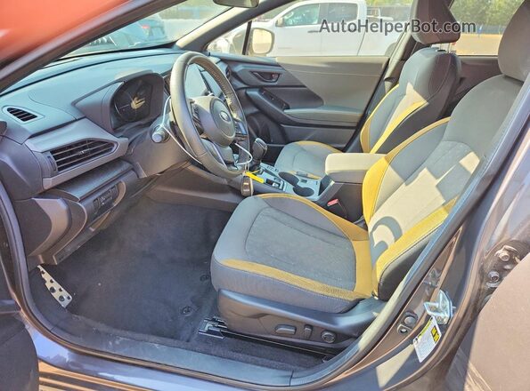 4S4GUHF62S3744788 2025 SUBARU CROSSTREK Серый Вид салона спереди
