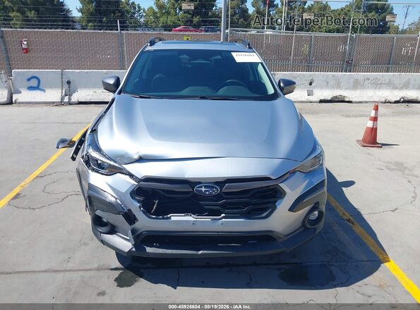 4S4GUHM62R3719340 2024 SUBARU CROSSTREK Серебряный Вид задней части салона