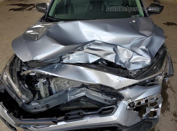 4S4GUHM65R3782397 2024 SUBARU CROSSTREK Silver Widok komory silnika
