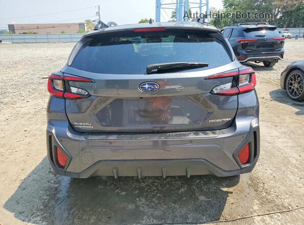 4S4GUHM68S3705626 2025 SUBARU CROSSTREK Silver უკანა ხედი