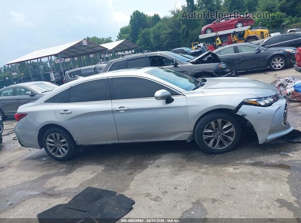 4T1AZ1FB9LU042393 2020 TOYOTA AVALON Серебряный Вид задней части салона