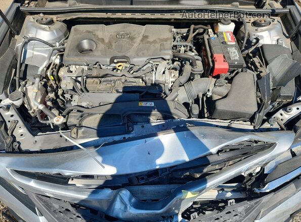4T1B11HK5JU670831 2018 TOYOTA CAMRY Silver Widok wnętrza z tyłu