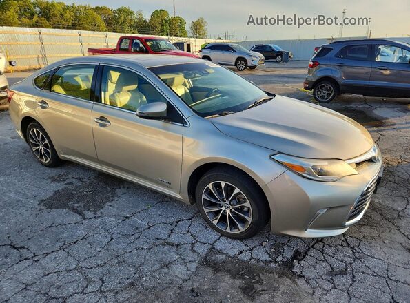 4T1BD1EB0JU063375 2018 TOYOTA AVALON Gold Front right