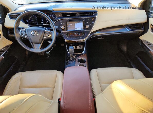4T1BD1EB0JU063375 2018 TOYOTA AVALON Gold Dashboard view