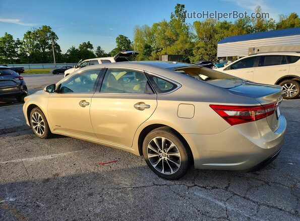 4T1BD1EB0JU063375 2018 TOYOTA AVALON Gold Rear left