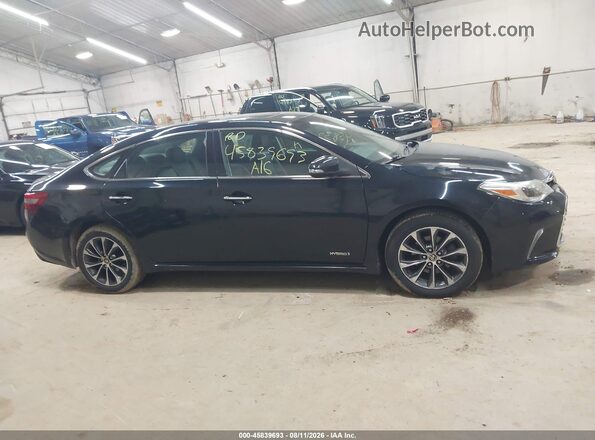 4T1BD1EB5GU050274 2016 TOYOTA AVALON HYBRID Black Вид задньої частини салону
