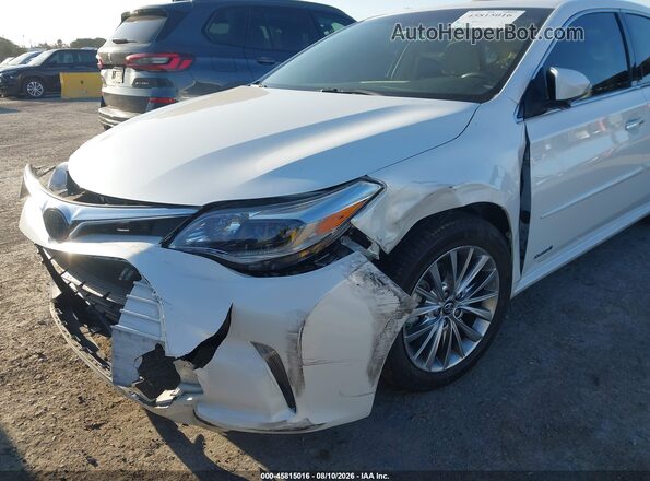 4T1BD1EB8GU055422 2016 TOYOTA AVALON HYBRID White Widok wnętrza z tyłu