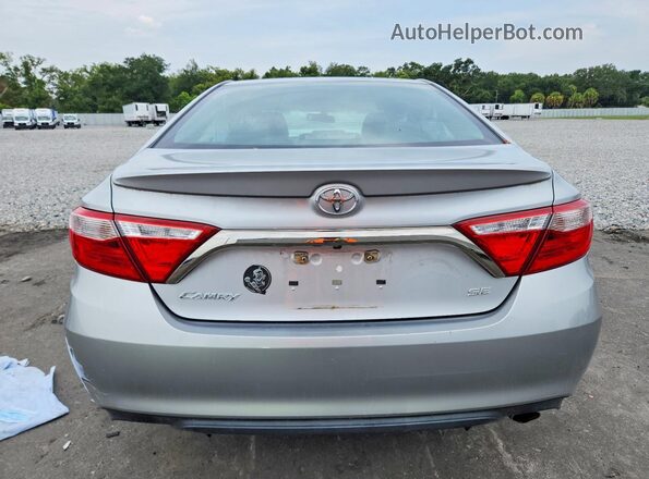 4T1BF1FK0GU252562 2016 TOYOTA CAMRY Silver Rear view