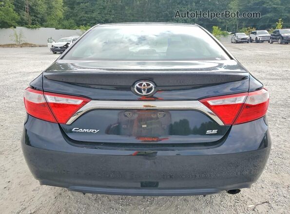 4T1BF1FK0GU601154 2016 TOYOTA CAMRY Black Rear view
