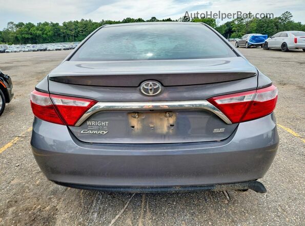 4T1BF1FK0HU720694 2017 TOYOTA CAMRY Charcoal Rear view