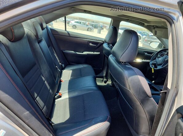 4T1BF1FK3GU178604 2016 TOYOTA CAMRY Silver Rear seats view