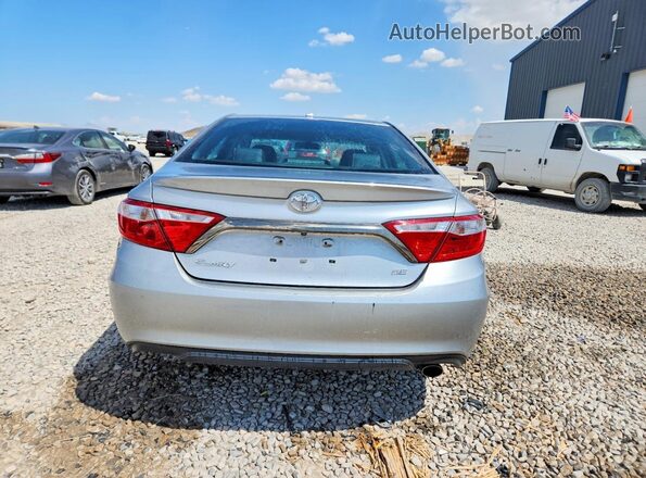 4T1BF1FK3GU178604 2016 TOYOTA CAMRY Silver Rear view