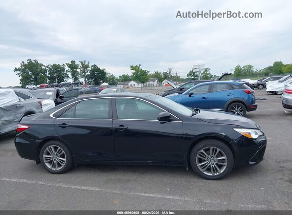 4T1BF1FK3HU615700 2017 TOYOTA CAMRY Black Вид задньої частини салону